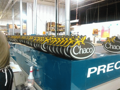 Display graphics such as shelf headers, counter displays and branding bricks